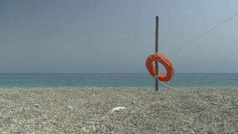 Safety buoy at beach Stock Footage 77972689
