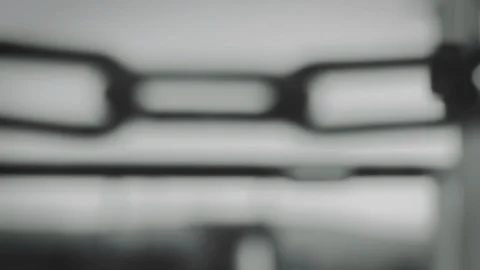 Safety chain waving in wind on cargo ship deck, black and white. Stock Footage 114508732