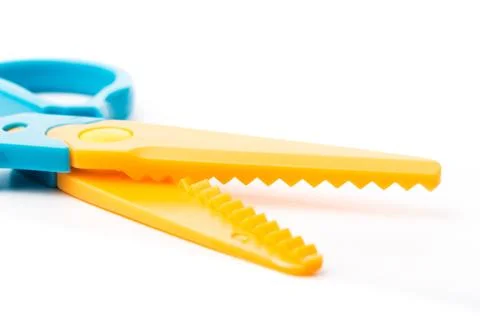 Safety colour scissors on a white background Stock Photos