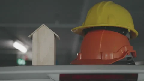 Safety Construction Worker Hats. Teamwork of the construction team Stock Footage 142077989