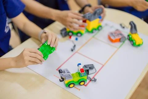 Safety engineer student using toy situation simulation learning safety proc.. Stock Photos