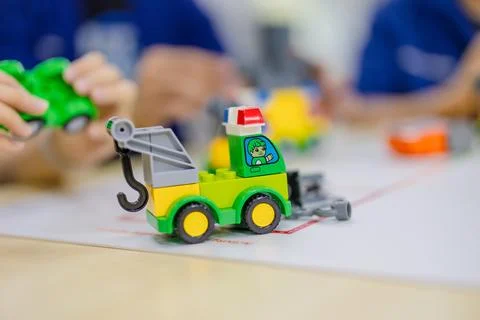 Safety engineer student using toy situation simulation learning safety proc.. Stock Photos