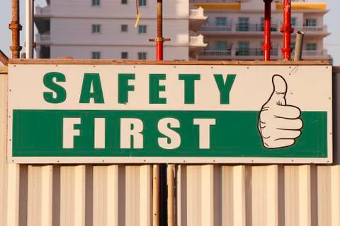 Safety first caution board fixed in a construction work site Foto stock