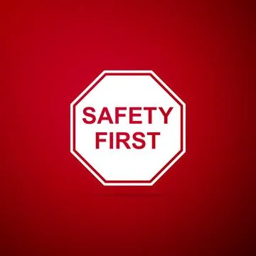 Safety First octagonal shape icon isolated on red background. Flat design Stock Illustration