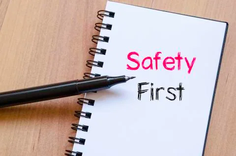 Safety first text concept on notebook Stock Photos