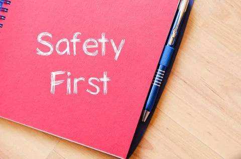 Safety first text concept on notebook Stock Photos