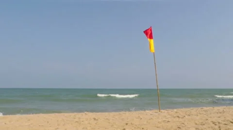 Safety Flag on Beach Stock Footage