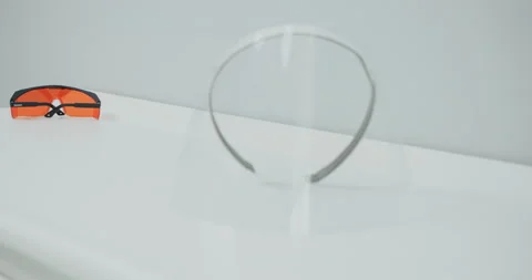 Safety glasses for doctors, on the table	 Stock Footage 140178689