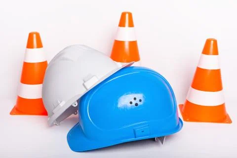 Safety helmets builder cone building site concept Foto stock