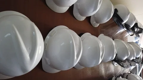 Safety Helmets hanging on the wall for engineering construction worker Video stock 111171408