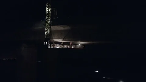 Safety Inspectors Working on a Bridge at Night Checking Structural Integrity Stock Footage 83095108