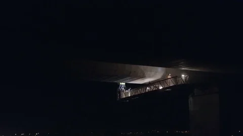 Safety Inspectors Working on a Bridge at Night Checking Structural Integrity Stock Footage 83096076