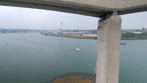 Safety Inspectors Working at Height on a Concrete Bridge Checking for Cracks Stock Footage 79242452