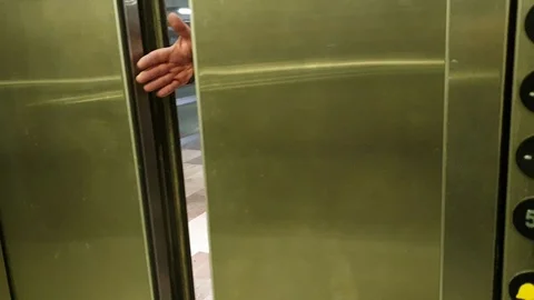 Safety mechanism for closing doors Elevator Stock Footage 101577815