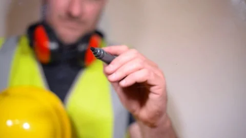 Safety officer writes future proofing on a glass screen Stock Footage 80171454