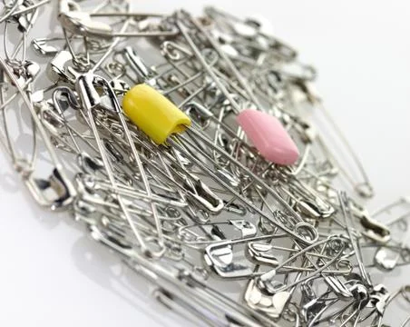 Safety pin background Stock Photos