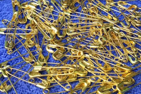 Safety pin background Stock Photos
