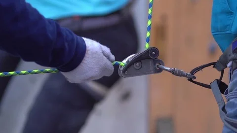 Safety rope for climbers in action. Close-up, daylight. Stock Footage 84731442