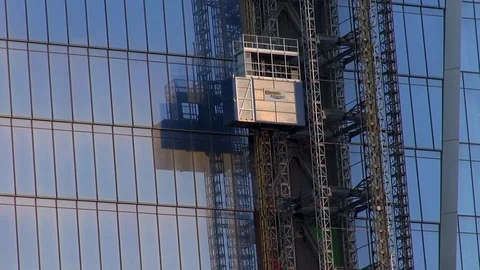 Safeway Atlantic Construction Elevator Descends on Side of Building Stock Footage 104217023