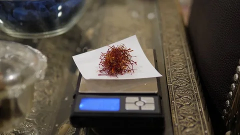 Safflower saffron scale weight For Diet Tea And Healthy Low Fat Cooking Herbal Stock Footage 108544852