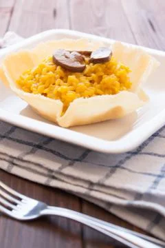 Saffron and mushroom risotto Stock Photos