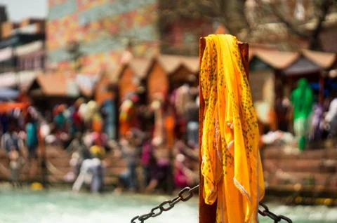 Saffron holy cloth in front of a crowd Stock Photos
