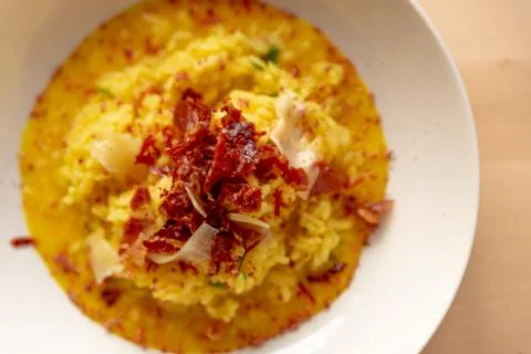 Saffron risotto close up, classic yellow colorful italian food staple dish on 스톡 사진