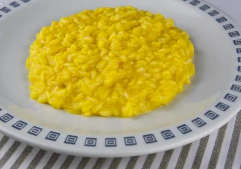 Saffron risotto, typical Milanese dish Milanese risotto Stock Photos