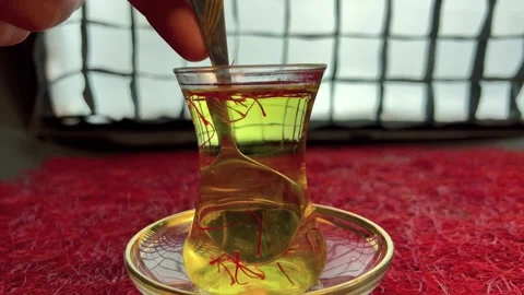 Saffron tea cup in the saffron background Stock Footage 171235398
