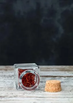 Saffron threads in an open jar Stock Photos