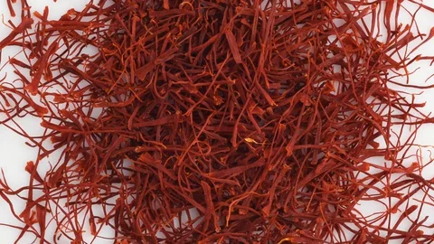 Saffron threads rotation top view. Macro dried flowers and leaves saffron 動画素材 128676202