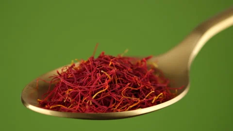 Saffron threads spice in golden spoon. Most expensive spice Video stock 197505237