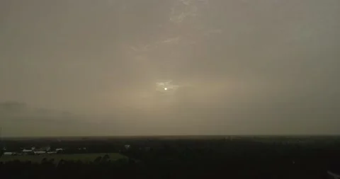 Sahara dust cloud covering a sunset in Florida Stock Footage 133605215