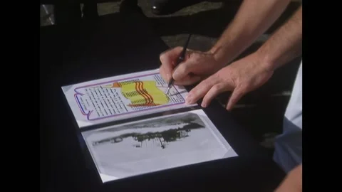 SAIGON - 1969 - Commodore Chon and Vice Admiral Zumwalt sign the transfer Stock Footage 316681192