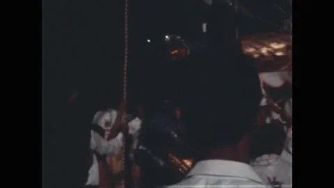 SAIGON - 1971: Dragon dance - The gold dragon curves overhead on poles Stock Footage 343938431