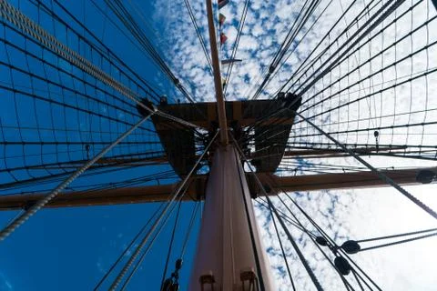 Sail on the background of clouds Stock Photos