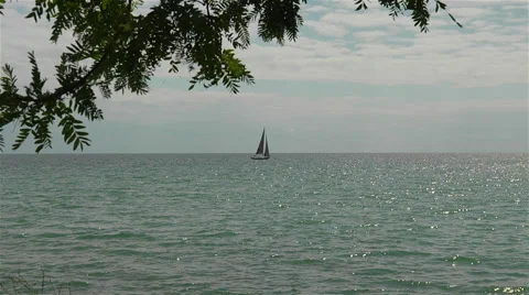 Sail boat in the distance Stock Footage 44528178