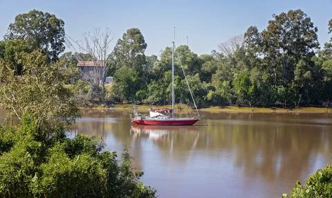 Sail boat moored in a river Stock Photos