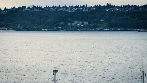 Sail boat moves through frame on Elliot Bay in Seattle. Stock Footage 73491916