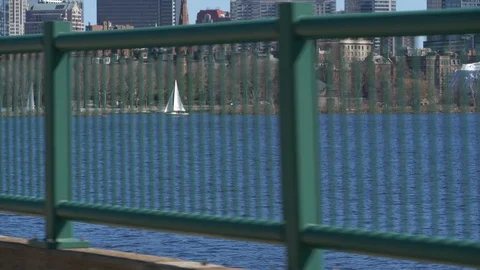 Sail Boat through Bars on Charles River in Boston, Massachusetts with Cityscape Stock Footage 92184162
