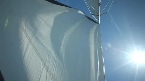 Sail floating in the wind on a beautiful sailboat Stock Footage