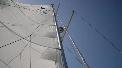 Sail over blue clear sky. Video stock 49035456