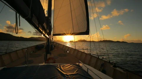 Sail in sunset Stock Footage