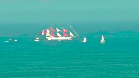 Sail training ship B.A.P. "Unión" with escort Stock Footage 277076721