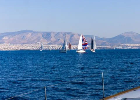 Sail vessel surfing on the sea Stock Photos