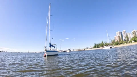 Sailboat Approaching and Docking Lakeside Stock Footage 285205055