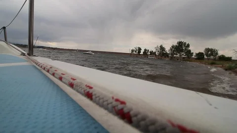 Sailboat beached during a storm Stock Footage 107175936