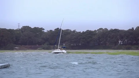 Sailboat being battered by the wind during tropical storm in South Carolina Stock Footage 72134436