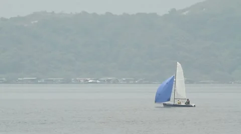 Sailboat with blue spinnaker Stock Footage 8635659