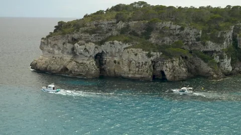 Sailboat in Cala Macarella during a windy day, Minorca, Balearic Islands Stock Footage 303752594